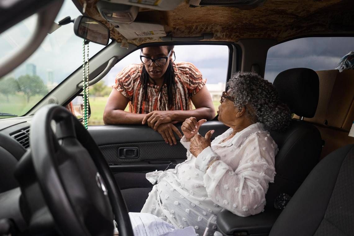 Amani Latimer Burris chats with Opal Lee while dropping off grocery boxes for farm manager Greg Joel on Sept. 1 at Opal’s Farm in Fort Worth. Photo Source: Yffy Yossifor from Star Telegram.