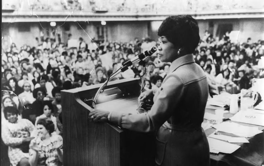 A black and white photograph of Wyatt in 1974 speaking at the first Coalition of Labor Union Women convention in Chicago. Photo Source: Chicago Public Library, Vivian G. Harsh Research Collection